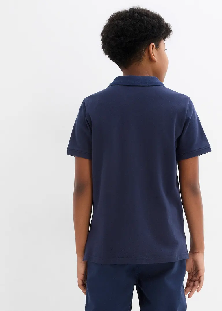 bonprix Schönes Basic Poloshirt für Jungen mit Seitenschlitzen - blau Im Verkauf